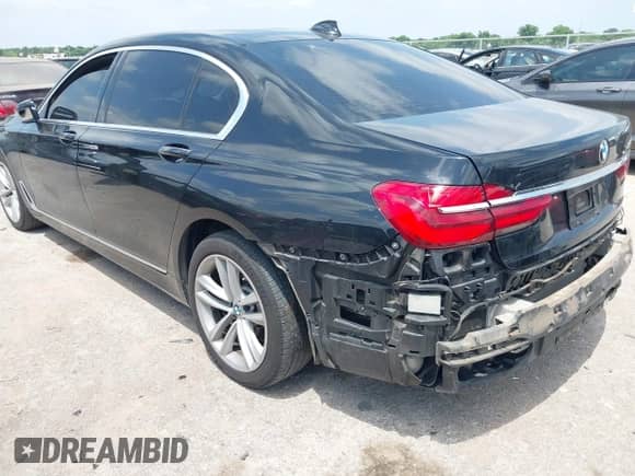 2018 BMW 7 Series 750i with VIN WBA7F0C57JGM23748, listed as a IAAI auction lot 42374137 with 111,120 mi miles and . Bid and sale history available at DreamBid. Image 19.