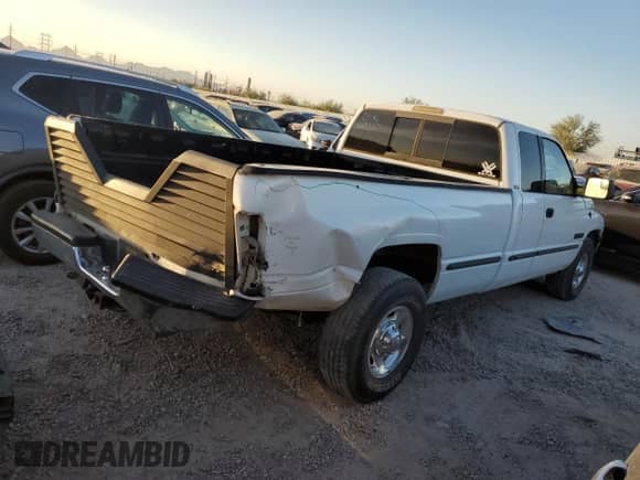 1999 Dodge 2500 with VIN 3B7KC2364XG112799, listed as a Copart auction lot 78217474 with 207,427 mi miles and Salvage title. Bid and sale history available at DreamBid. Image 3.