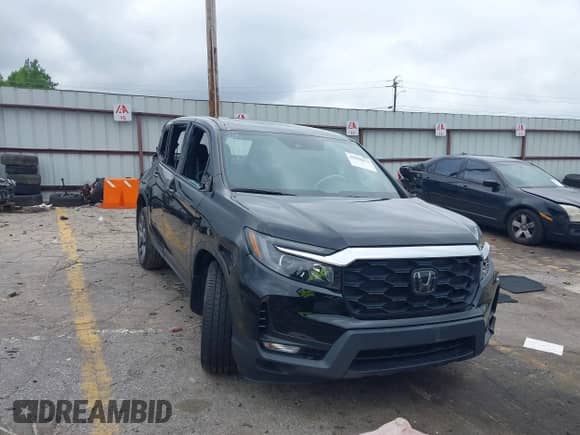 2023 Honda Passport EX-L with VIN 5FNYF8H56PB009779, listed as a IAAI auction lot 42502614 with 35,809 mi miles and . Bid and sale history available at DreamBid. Image 1.