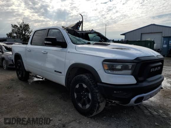2019 Ram 1500 Rebel z VIN 1C6RRELT2KN828225, wystawiony jako Copart lot #71549272 z przebiegiem 155 960 mil mil oraz Szkoda całkowita • Salvage title. Historia ofert i sprzedaży dostępna na DreamBid. Obrazek 4.