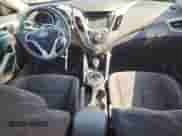 2014 Hyundai Veloster с VIN KMHTC6AD2EU208305, выставлен на аукционе Copart как лот 81756115 с пробегом Не указан миль и Списание • Salvage title. История ставок и продаж доступна на DreamBid. Изображение 8.