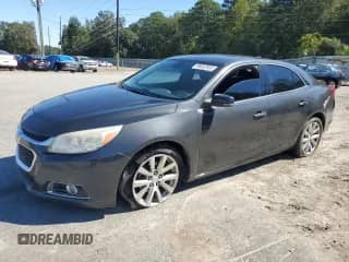2014 Chevrolet Malibu LTZ with VIN 1G11H5SL0EF209060, listed as a Copart auction lot 86602555 with 323,622 mi miles and Salvage title. Bid and sale history available at DreamBid. Image 1.