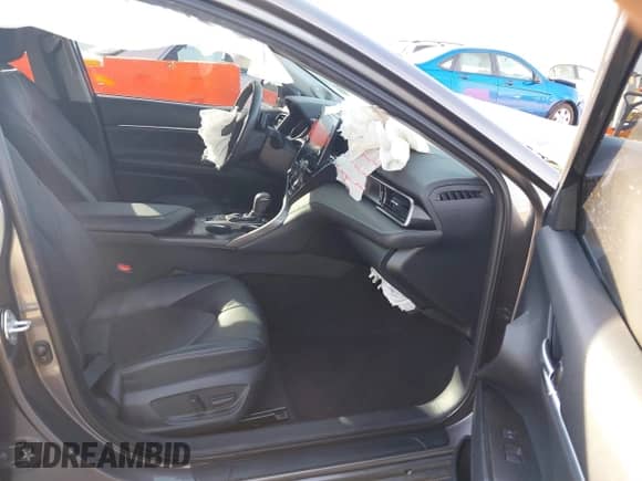 2021 Toyota Camry Hybrid XSE with VIN 4T1K31AK2MU023604, listed as a IAAI auction lot 41476057 with 26,211 mi miles and . Bid and sale history available at DreamBid. Image 5.