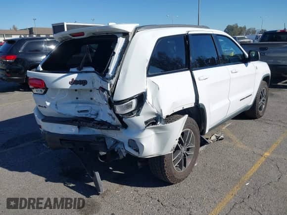 2017 Jeep Grand Cherokee Trailhawk z VIN 1C4RJFLGXHC959092, wystawiony jako IAAI lot #41232281 z przebiegiem 108 659 mil mil oraz . Historia ofert i sprzedaży dostępna na DreamBid. Obrazek 4.