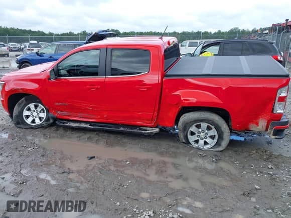 2019 Chevrolet Colorado 2WD Work Truck z VIN 1GCGSBENXK1261514, wystawiony jako IAAI lot #42902686 z przebiegiem 43 964 mil mil oraz . Historia ofert i sprzedaży dostępna na DreamBid. Obrazek 14.