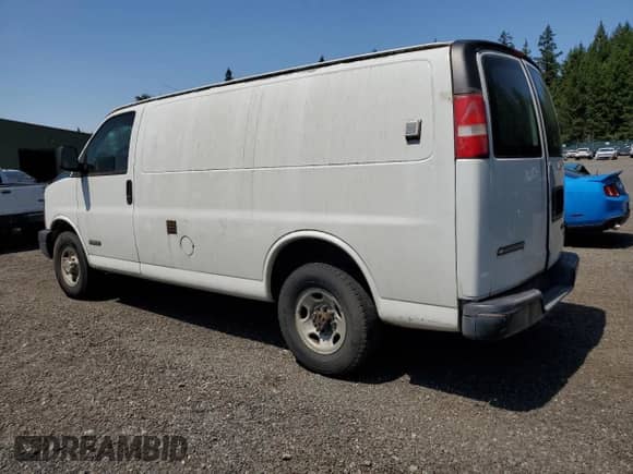 2003 Chevrolet Express Cargo с VIN 1GCHG35U631195547, выставлен на аукционе Copart как лот 59064005 с пробегом Не указан миль и Чистый • Clean title. История ставок и продаж доступна на DreamBid. Изображение 2.