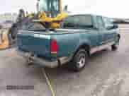 1997 Ford F-150 XL with VIN 1FTEX17LXVNC32588, listed as a IAAI auction lot 40848063 with 210,113 mi miles and . Bid and sale history available at DreamBid. Image 4.