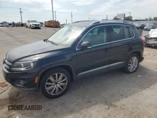 2014 Volkswagen Tiguan S with VIN WVGAV3AX6EW553772, listed as a Copart auction lot 80031625 with 149,020 mi miles and Salvage title. Bid and sale history available at DreamBid. Image 1.