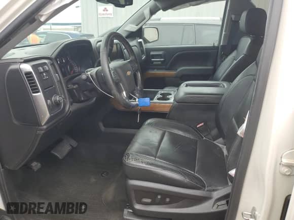 2014 Chevrolet Silverado 1500 LTZ with VIN 3GCPCSEC6EG534191, listed as a Copart auction lot 57961855 with 127,305 mi miles and Salvage title. Bid and sale history available at DreamBid. Image 7.