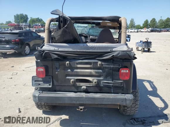 2001 Jeep Wrangler Sahara with VIN 1J4FA59S61P352141, listed as a Copart auction lot 66212355 with Not provided miles and Clean title. Bid and sale history available at DreamBid. Image 6.