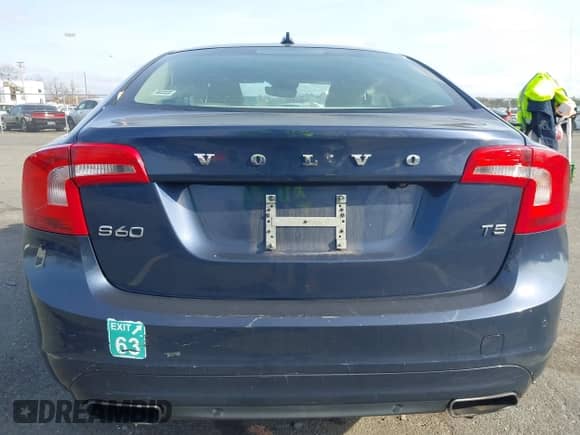 2015 Volvo S60 T5 Drive-E Premier with VIN YV126MFK1F2336609, listed as a IAAI auction lot 41786376 with 50,538 mi miles and . Bid and sale history available at DreamBid. Image 16.