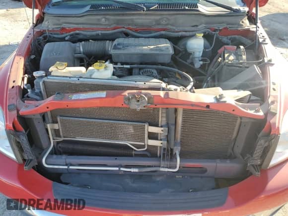 2007 Dodge 1500 ST z VIN 1D7HU18P57J555678, wystawiony jako Copart lot #79075094 z przebiegiem 93 548 mil mil oraz Szkoda całkowita • Salvage title. Historia ofert i sprzedaży dostępna na DreamBid. Obrazek 11.