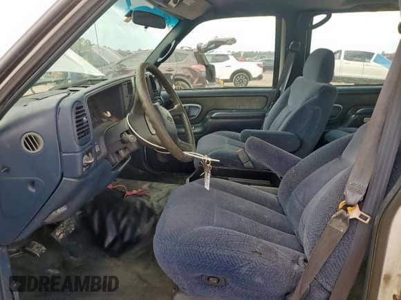 1999 Chevrolet Tahoe Police Special z VIN 1GNEC13RXXR152653, wystawiony jako Copart lot #68429955 z przebiegiem 197 346 mil mil oraz Szkoda całkowita • Salvage title. Historia ofert i sprzedaży dostępna na DreamBid. Obrazek 7.