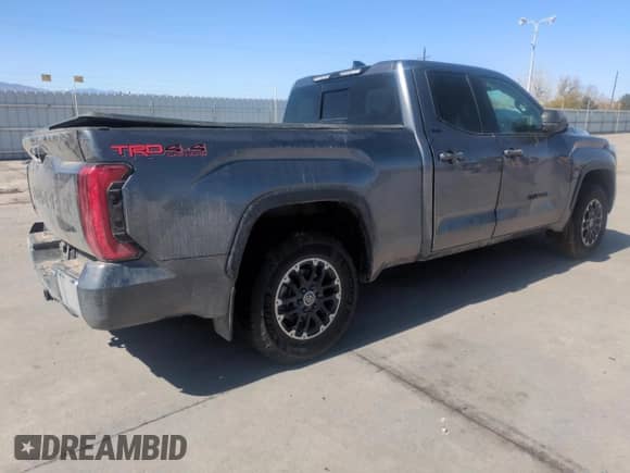 2023 Toyota Tundra SR5 with VIN 5TFLA5DA2PX119857, listed as a Copart auction lot 51942595 with Not provided miles and Salvage title. Bid and sale history available at DreamBid. Image 3.