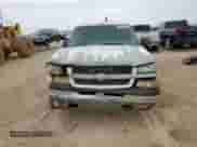2004 Chevrolet Silverado 1500 Work Truck with VIN 2GCEC19V641173274, listed as a Copart auction lot 70104735 with 184,952 mi miles and Salvage title. Bid and sale history available at DreamBid. Image 5.
