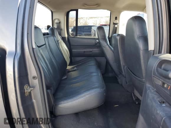 2002 Dodge Dakota Sport z VIN 1B7HL38N72S715327, wystawiony jako Copart lot #46477865 z przebiegiem 225 619 mil mil oraz Szkoda całkowita • Salvage title. Historia ofert i sprzedaży dostępna na DreamBid. Obrazek 10.
