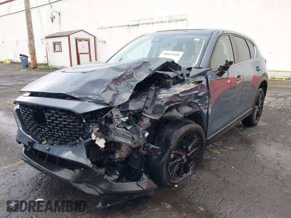 2023 Mazda CX-5 S Carbon Edition z VIN JM3KFBCM2P0212062, wystawiony jako IAAI lot #40853928 z przebiegiem 25 463 mil mil oraz . Historia ofert i sprzedaży dostępna na DreamBid. Obrazek 6.