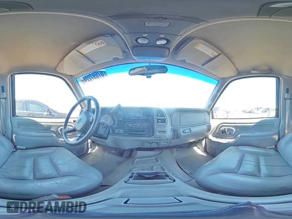 1999 Chevrolet Tahoe z VIN 3GNEK18R5XG184695, wystawiony jako Copart lot #67697224 z przebiegiem 135 316 mil mil oraz Szkoda całkowita • Salvage title. Historia ofert i sprzedaży dostępna na DreamBid. Obrazek 13.