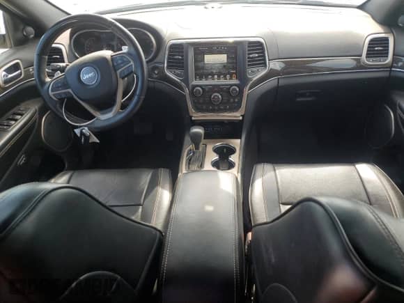 2017 Jeep Grand Cherokee Overland with VIN 1C4RJFCG9HC800659, listed as a Copart auction lot 67804285 with 105,483 mi miles and Salvage title. Bid and sale history available at DreamBid. Image 8.
