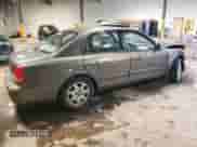 2001 Hyundai Sonata GLS z VIN KMHWF35V61A465100, wystawiony jako Copart lot #58200475 z przebiegiem 86 066 mil mil oraz Szkoda całkowita • Salvage title. Historia ofert i sprzedaży dostępna na DreamBid. Obrazek 3.