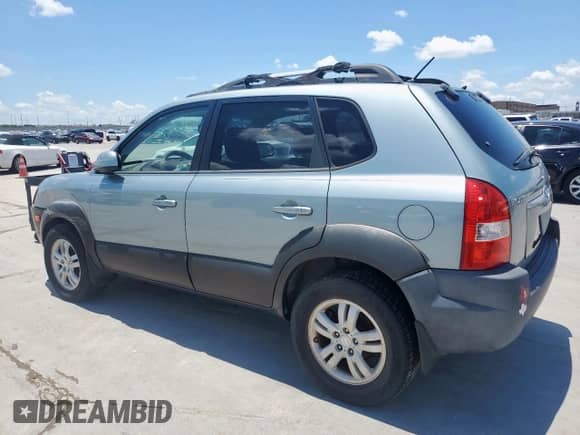 2007 Hyundai Tucson SE z VIN KM8JN12D87U612991, wystawiony jako Copart lot #62695105 z przebiegiem 205 940 mil mil oraz Szkoda całkowita • Salvage title. Historia ofert i sprzedaży dostępna na DreamBid. Obrazek 2.