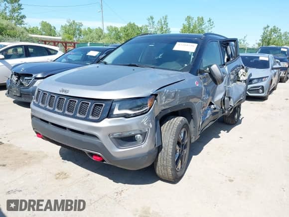 2018 Jeep Compass Trailhawk z VIN 3C4NJDDB9JT272864, wystawiony jako IAAI lot #42284940 z przebiegiem Nie podano mil oraz . Historia ofert i sprzedaży dostępna na DreamBid. Obrazek 16.