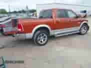 2013 Ram 1500 Laramie with VIN 1C6RR6NT2DS694274, listed as a IAAI auction lot 42488798 with 234,825 mi miles and . Bid and sale history available at DreamBid. Image 4.