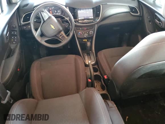 2018 Chevrolet Trax LS с VIN KL7CJNSBXJB600713, выставлен на аукционе Copart как лот 84022235 с пробегом 97 563 миль миль и Списание • Salvage title. История ставок и продаж доступна на DreamBid. Изображение 8.
