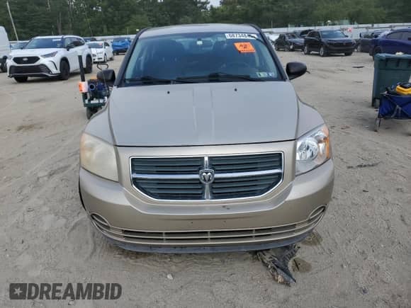 2010 Dodge Caliber SXT with VIN 1B3CB4HAXAD540088, listed as a Copart auction lot 68734845 with 153,998 mi miles and Salvage title. Bid and sale history available at DreamBid. Image 5.