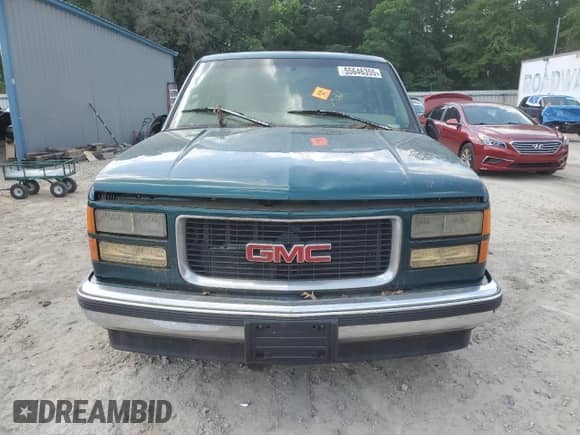 1997 GMC Sierra 1500 z VIN 2GTEC19R4V1506513, wystawiony jako Copart lot #55646355 z przebiegiem Nie podano mil oraz Czysty tytuł • Clean title. Historia ofert i sprzedaży dostępna na DreamBid. Obrazek 5.