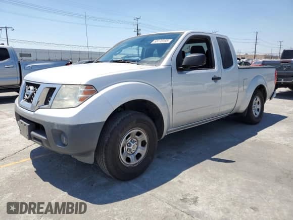 2015 Nissan Frontier S with VIN 1N6BD0CT4FN710899, listed as a Copart auction lot 68178195 with 77,785 mi miles and Salvage title. Bid and sale history available at DreamBid. Image 1.