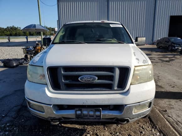 2004 Ford F-150 XLT z VIN 1FTPW145X4KC79394, wystawiony jako Copart lot #86680235 z przebiegiem 394 387 mil mil oraz Szkoda całkowita • Salvage title. Historia ofert i sprzedaży dostępna na DreamBid. Obrazek 5.