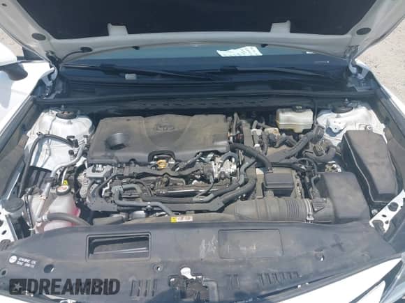 2022 Toyota Camry Hybrid LE with VIN 4T1C31AK2NU591549, listed as a IAAI auction lot 42499072 with 55,882 mi miles and . Bid and sale history available at DreamBid. Image 10.