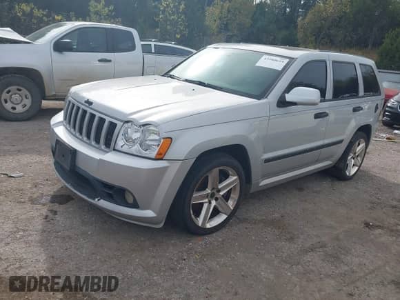 2006 Jeep Grand Cherokee SRT-8 with VIN 1J8HR78316C341911, listed as a IAAI auction lot 43580619 with 146,360 mi miles and . Bid and sale history available at DreamBid. Image 17.