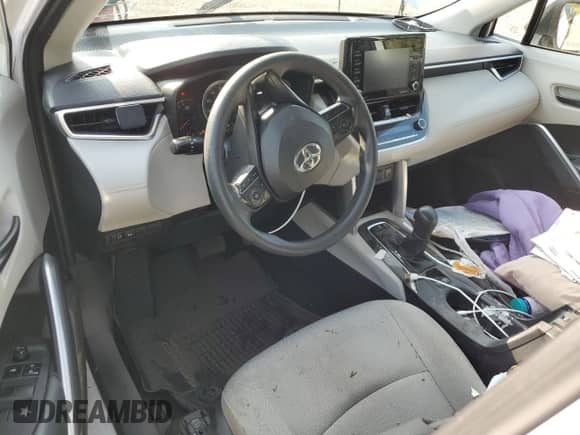 2022 Toyota Corolla Cross L with VIN 7MUAAABG1NV033438, listed as a Copart auction lot 66135615 with 116,699 mi miles and Salvage title. Bid and sale history available at DreamBid. Image 8.