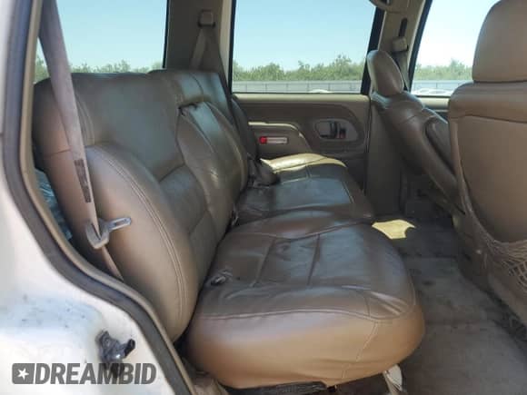 1996 Chevrolet Tahoe с VIN 1GNEK13R2TJ414225, выставлен на аукционе Copart как лот 65547245 с пробегом 209 449 миль миль и Списание • Salvage title. История ставок и продаж доступна на DreamBid. Изображение 11.