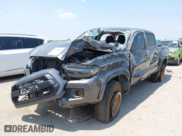 2021 Toyota Tacoma SR5 with VIN 5TFAZ5CN1MX118036, listed as a IAAI auction lot 42840652 with 73,082 mi miles and . Bid and sale history available at DreamBid. Image 17.
