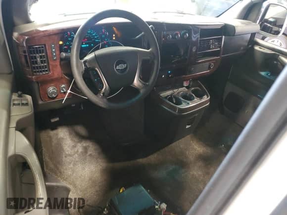 2009 Chevrolet Express Passenger with VIN 1GAHG35K491170193, listed as a Copart auction lot 59088775 with 182,810 mi miles and Salvage title. Bid and sale history available at DreamBid. Image 8.