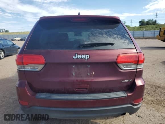 2016 Jeep Grand Cherokee Laredo with VIN 1C4RJEAG3GC453521, listed as a Copart auction lot 65282905 with 92,727 mi miles and Salvage title. Bid and sale history available at DreamBid. Image 6.