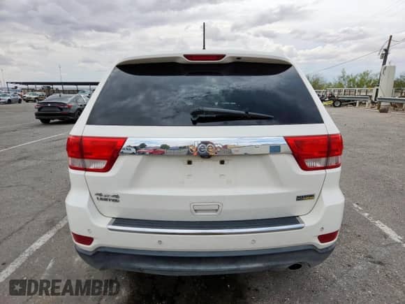 2012 Jeep Grand Cherokee Limited z VIN 1C4RJFBG0CC314672, wystawiony jako Copart lot #80743195 z przebiegiem 123 504 mil mil oraz Szkoda całkowita • Salvage title. Historia ofert i sprzedaży dostępna na DreamBid. Obrazek 6.