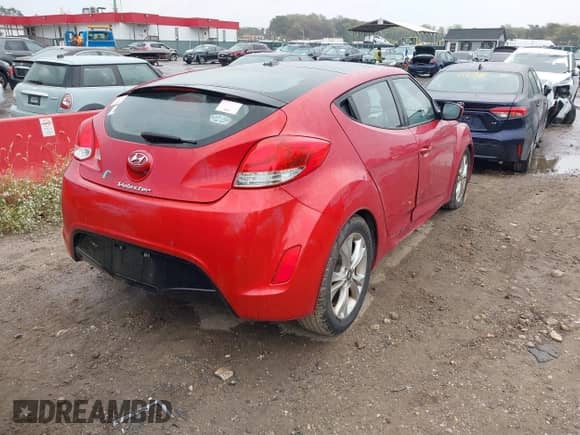 2012 Hyundai Veloster w/Gray Int z VIN KMHTC6AD1CU054540, wystawiony jako IAAI lot #43437087 z przebiegiem 173 534 mil mil oraz . Historia ofert i sprzedaży dostępna na DreamBid. Obrazek 4.