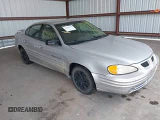 2001 Pontiac Grand Am SE z VIN 1G2NE52T81M648017, wystawiony jako IAAI lot #42354372 z przebiegiem 206 086 mil mil oraz . Historia ofert i sprzedaży dostępna na DreamBid. Obrazek 1.