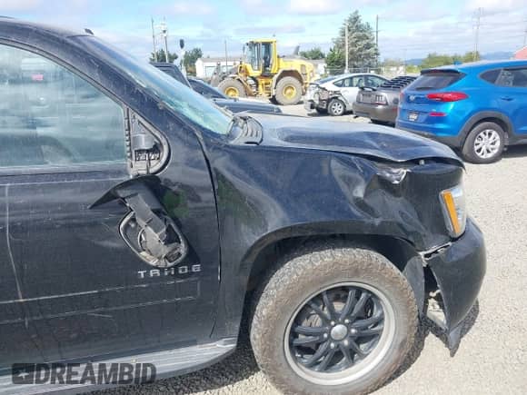 2013 Chevrolet Tahoe LS with VIN 1GNSKAE09DR234776, listed as a IAAI auction lot 42605423 with 200,433 mi miles and . Bid and sale history available at DreamBid. Image 18.