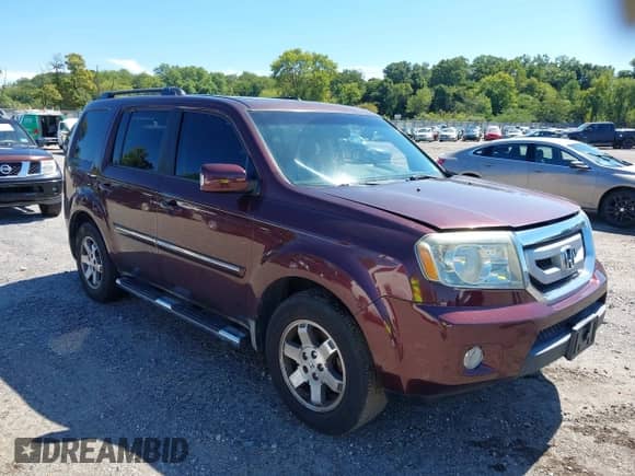 2009 Honda Pilot Touring with VIN 5FNYF48939B005946, listed as a IAAI auction lot 43178572 with 158,130 mi miles and . Bid and sale history available at DreamBid. Image 1.