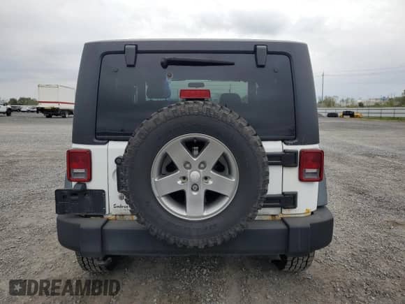 2011 Jeep Wrangler Sport с VIN 1J4AA2D18BL584837, выставлен на аукционе Copart как лот 81717735 с пробегом 211 127 миль миль и Чистый • Clean title. История ставок и продаж доступна на DreamBid. Изображение 6.