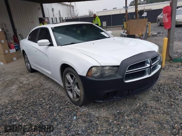 2013 Dodge Charger SXT with VIN 2C3CDXJG8DH528767, listed as a IAAI auction lot 41627596 with 204,619 mi miles and . Bid and sale history available at DreamBid. Image 1.