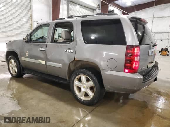 2007 Chevrolet Tahoe LS with VIN 1GNFK13017J165573, listed as a Copart auction lot 57634325 with 231,055 mi miles and Salvage title. Bid and sale history available at DreamBid. Image 2.