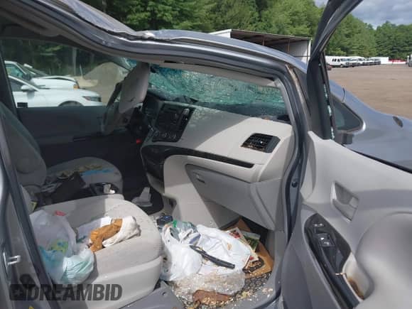 2012 Toyota Sienna LE AAS with VIN 5TDKK3DC1CS205594, listed as a IAAI auction lot 42749193 with 129,363 mi miles and . Bid and sale history available at DreamBid. Image 5.