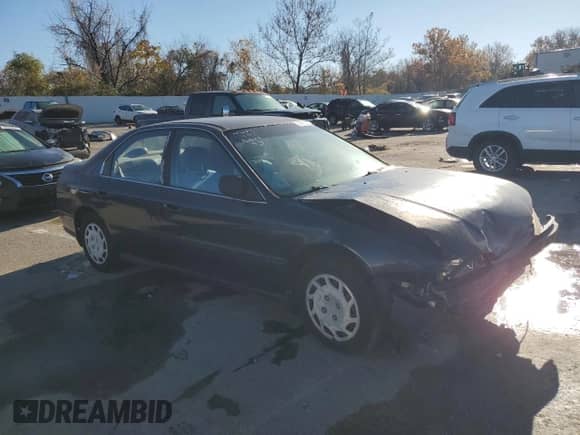 1994 Honda Accord LX с VIN 1HGCD5638RA000515, выставлен на аукционе Copart как лот 70008695 с пробегом 162 009 миль миль и На запчасти • Non repairable. История ставок и продаж доступна на DreamBid. Изображение 4.