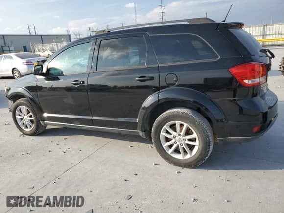 2017 Dodge Journey SXT with VIN 3C4PDCBG3HT572516, listed as a Copart auction lot 90021075 with 202,785 mi miles and Clean title. Bid and sale history available at DreamBid. Image 2.